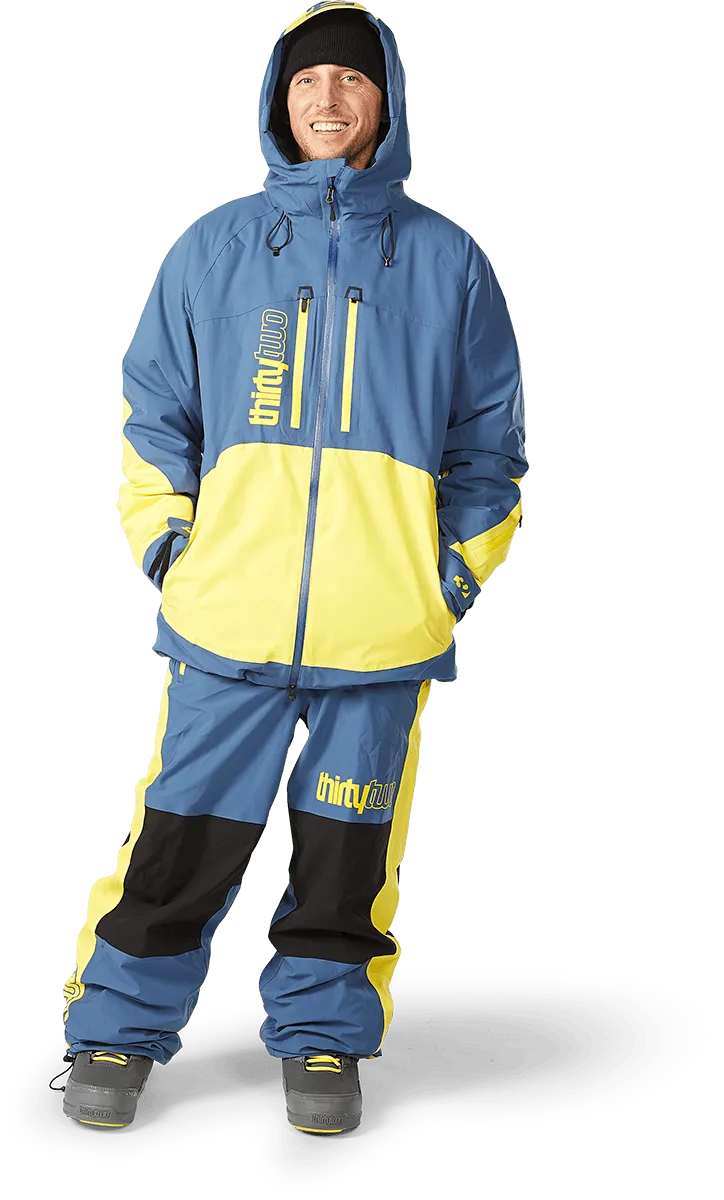 Thirtytwo Lashed veste snowboard isolée Stevens bleu jaune