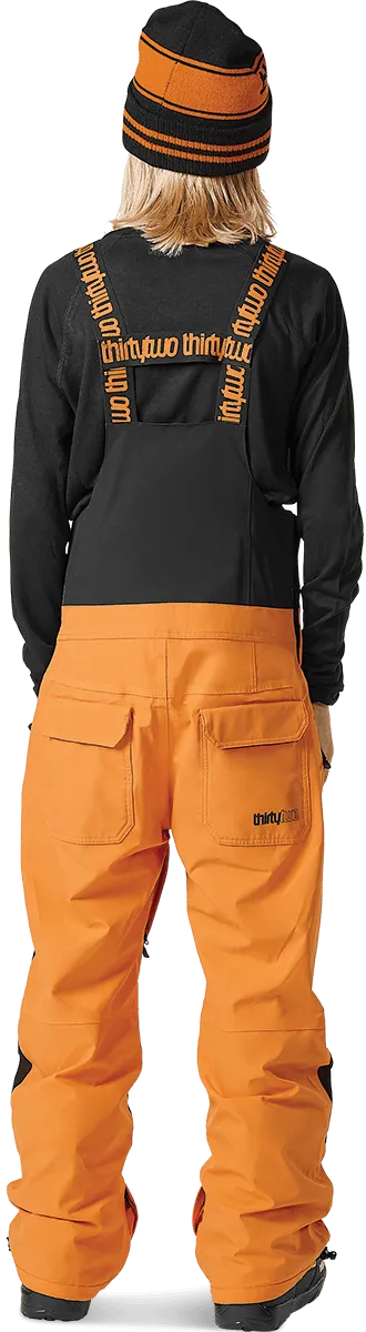 Thirtytwo Youth Basement Bib salopette snowboard noir/orange